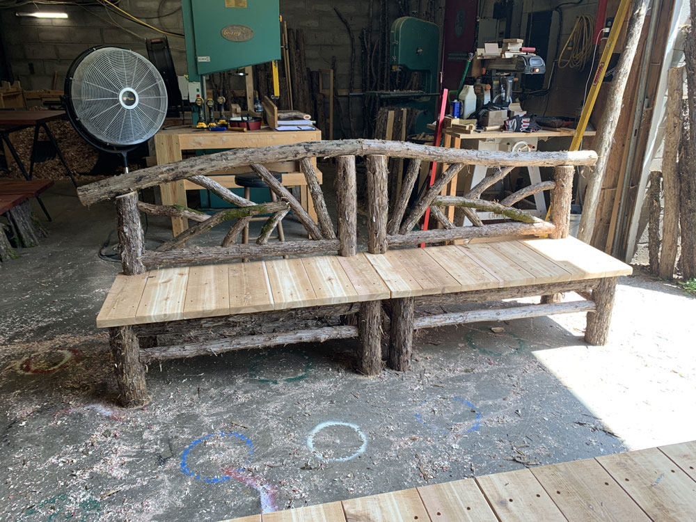 Outdoor rustic benches built for an outdoor table titled the Knapp Benches
