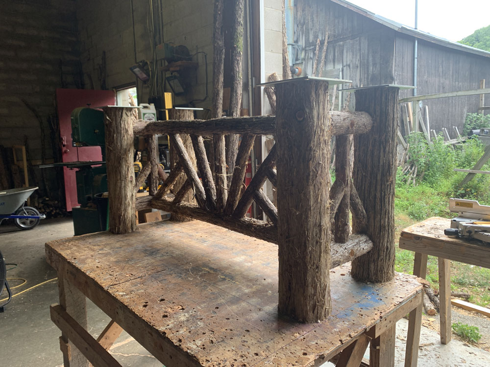 Outdoor rustic benches built for an outdoor table titled the Knapp Benches