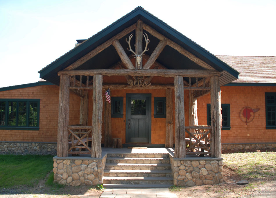 Rustic railings custom built using cedar trees and branches titled the Bearsville Railings