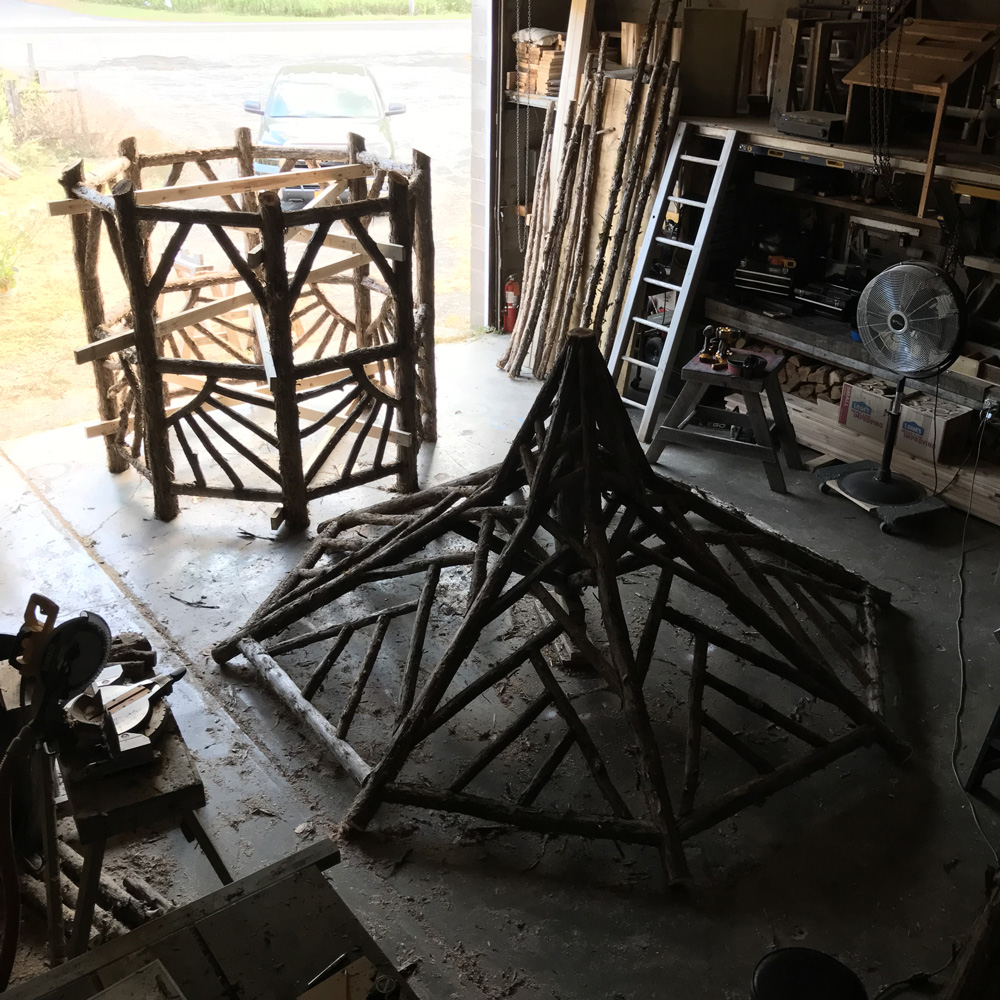 Natural wood two story gazebo built with trees and branches titled the Taunton Hill Tree Tower