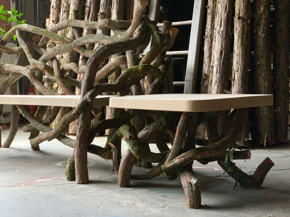 Outdoor rustic park bench built using mountain laurel trees and branches titled the Mountain Laurel Bench & Table Set