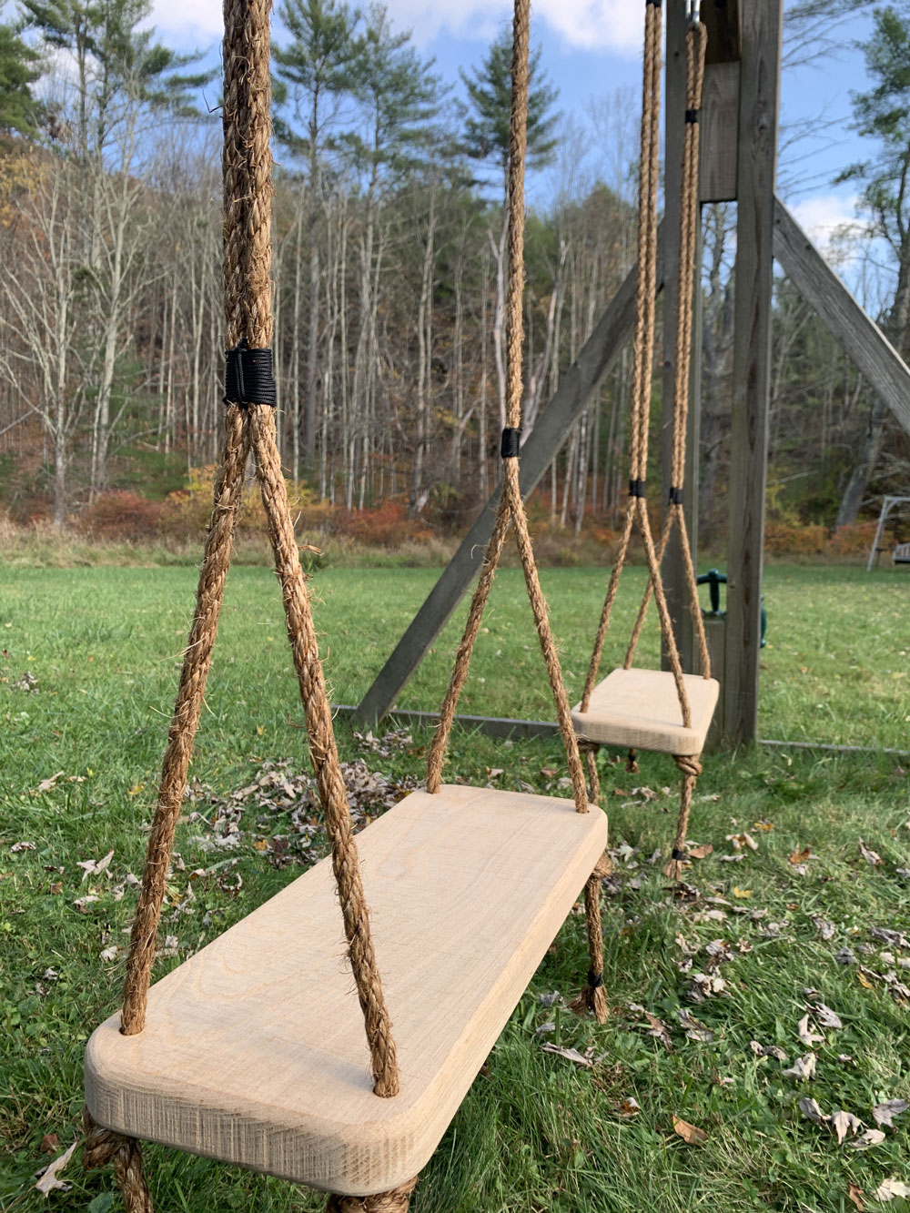 Custom swings built using white oak planks.