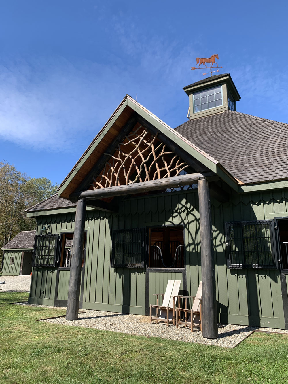 Rustic barn pediment built using mountain laurel trees and branches titled the East Meadowbrook Pediment