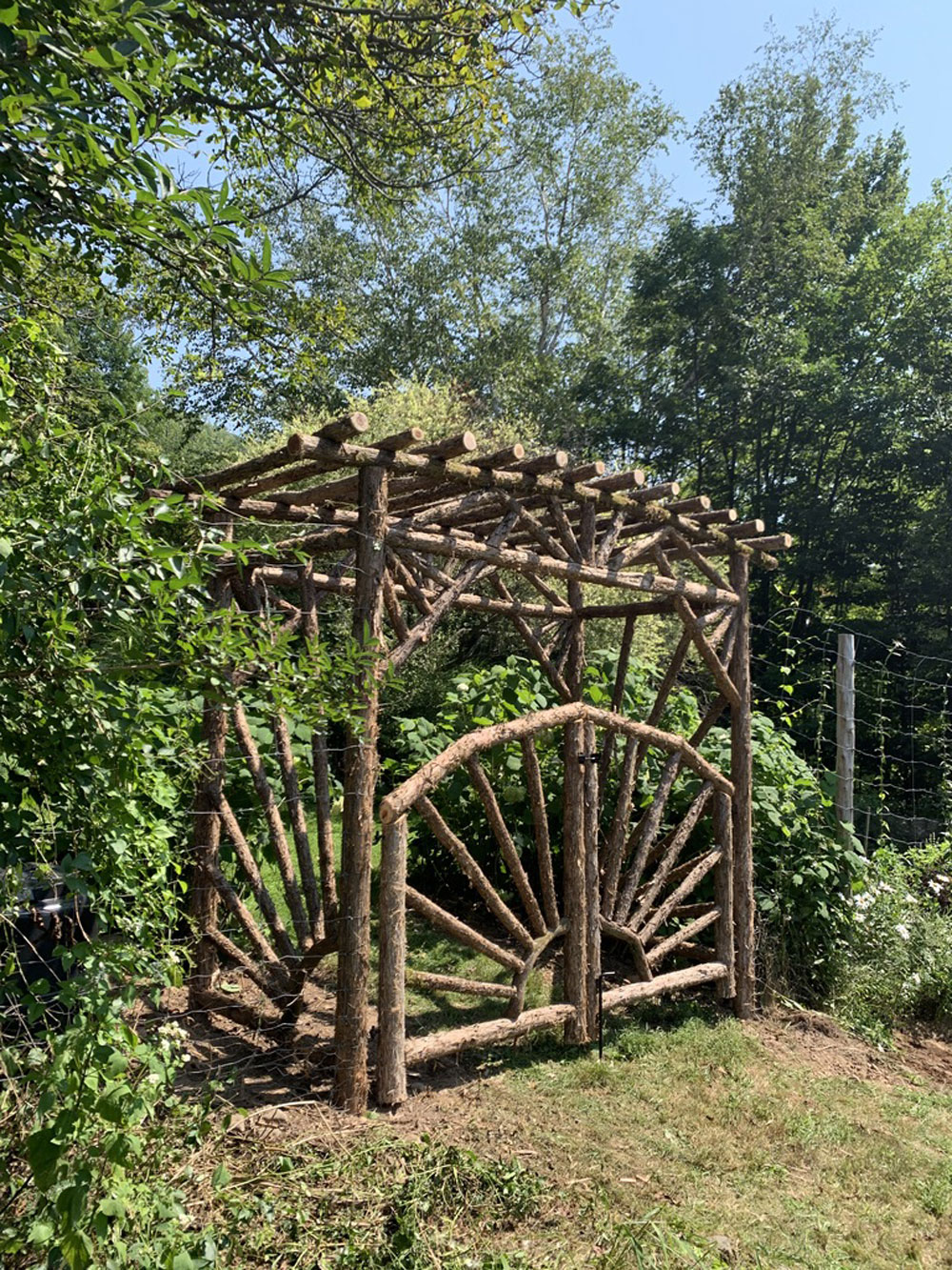 Rustic garden arbor and gate built using bark-on trees and branches titled the Meads Mountain Arbor & Gates