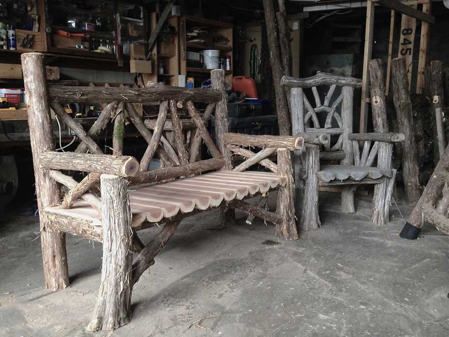 Exterior twig bench built from cedar logs titled the Pachman Bench