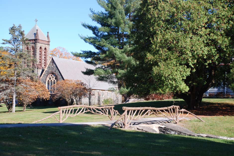 Bridge railings built in the rustic style using cedar trees and branches titled Staatsburg Bridge Railings