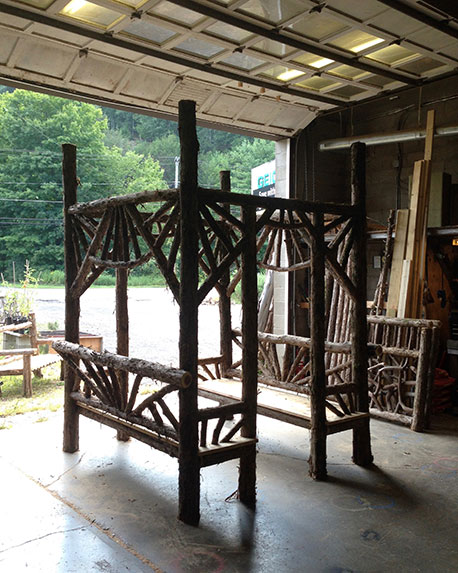 Rustic gazebo built in the rustic style using logs and branches titled the Briarcliffe Shelter