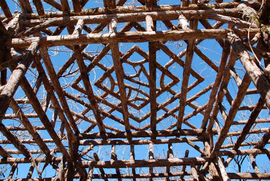 Branchwork rustic pergola constructed using natural materials titled the Mercer Rose