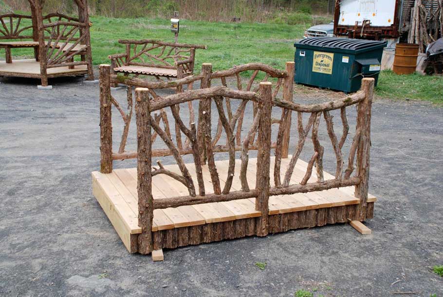 Natural wood bridge ready to ship built with trees and branches titled the Maplewood Bridge