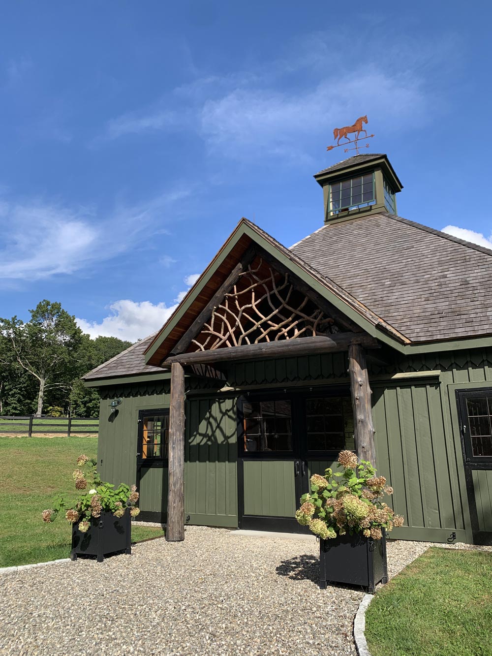 Custom built decorative pediment built using mountain laurel branches titled the East Meadowbrook Pediment