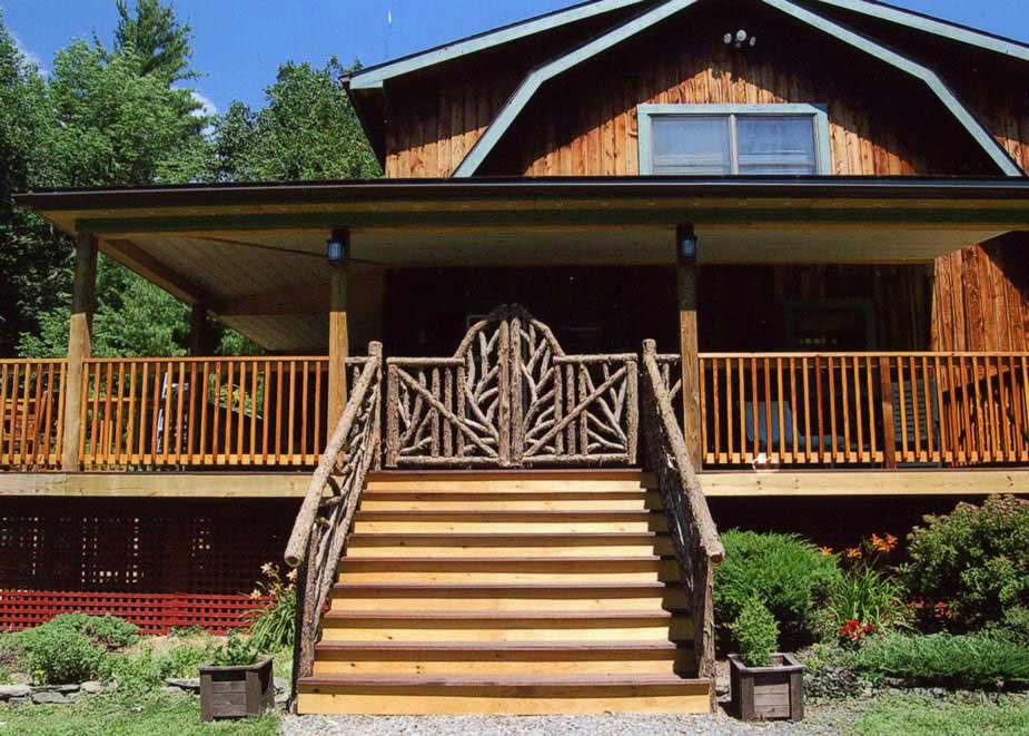 Rustic deck gates built using bark-on trees and branches titled Salem Deck Gates